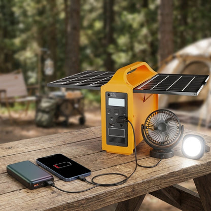 Solar power station 100W standing on a camp table at dusk