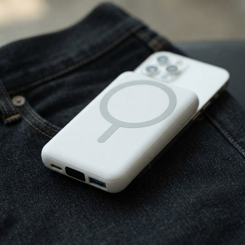 Mini powerbank for iPhone standing on edge to show its thickness