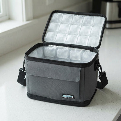 Freezable lunch cooler bag open on a worktop showing ice panels on every wall