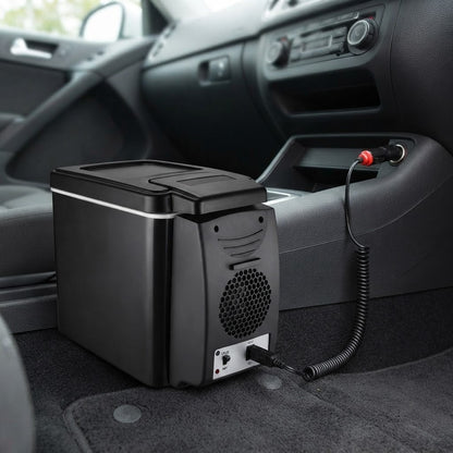 12v cool box in a car footwell plugged into the vehicle socket