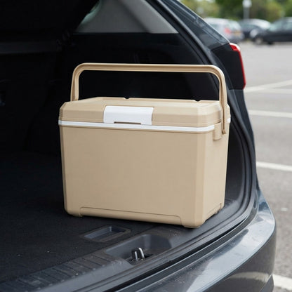Foam ice chest loaded on the boot sill of a car