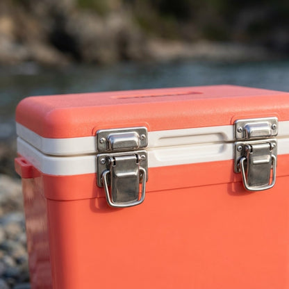 Hard shell cooler close up on the gasket seal and latch by the water