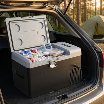 22 quart portable ice box open in a car boot at a campsite