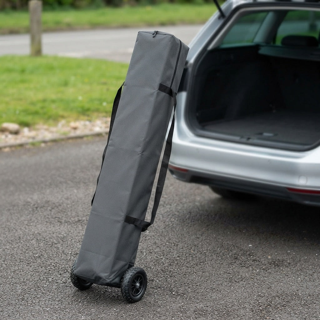canopy tent wheeled carry bag beside an open car boot